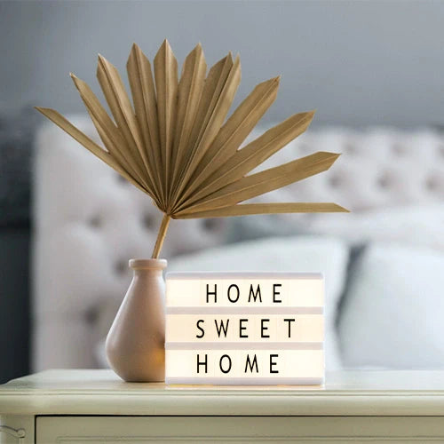 Modern home decor items like cushions, vases, and wall art from Shop Namo.