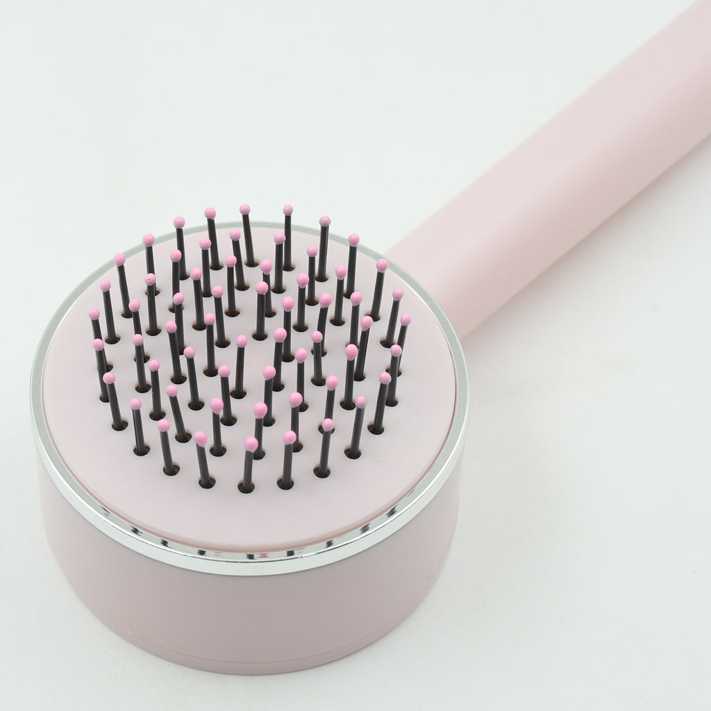 Air Cushion Massage Brush with Self‑Cleaning Detangling Comb
